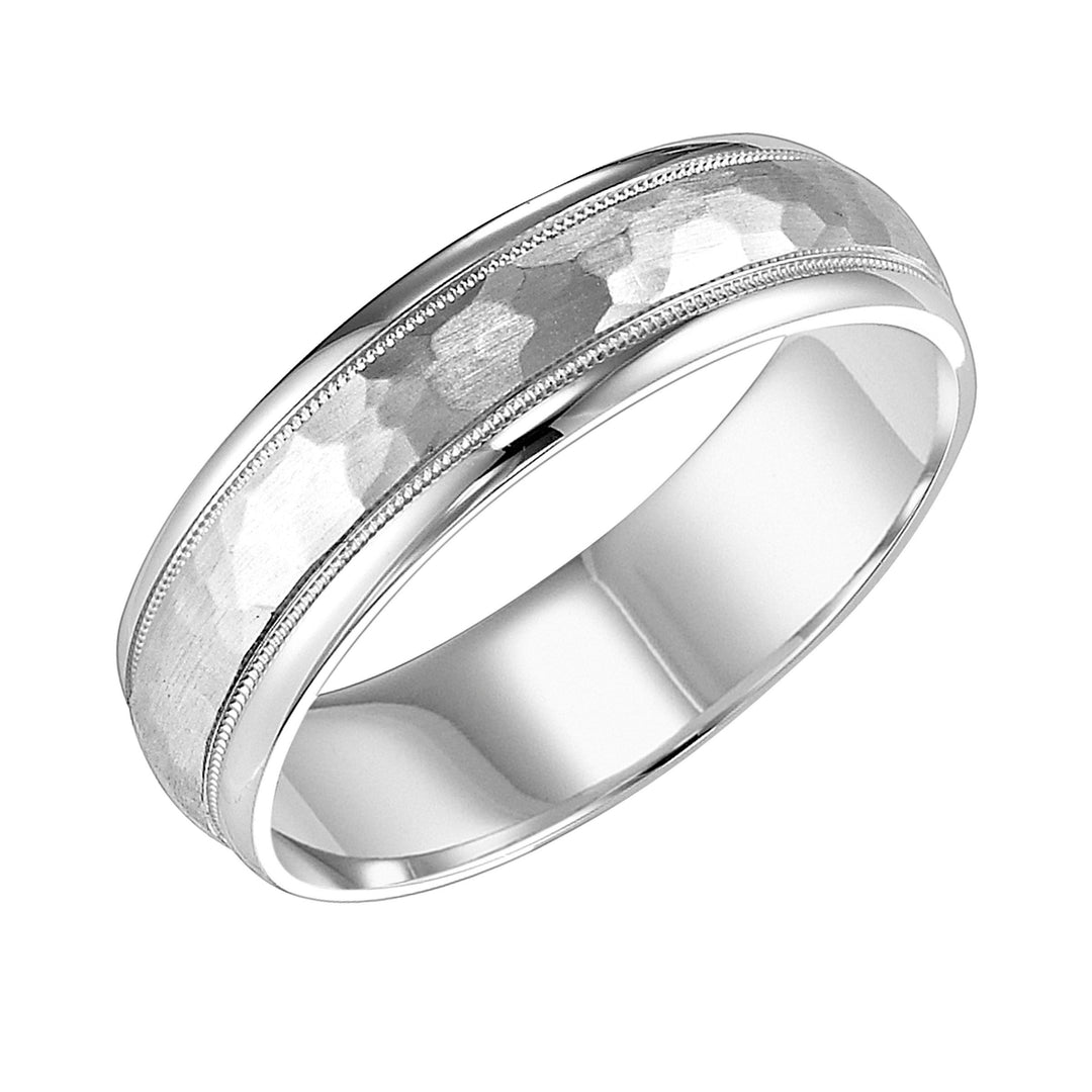 11-6867W-G.00 - Goldman - This low domed Comfort Fit wed band features a brushd hammerd finish with milgrn and round edges to complete this luxurious yet classic look Pls note hand hammerd styles will have slight variations due to the nature of the m
