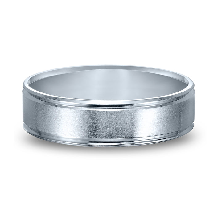 Comfort fit wedding band with brushed finish and beveled edges.