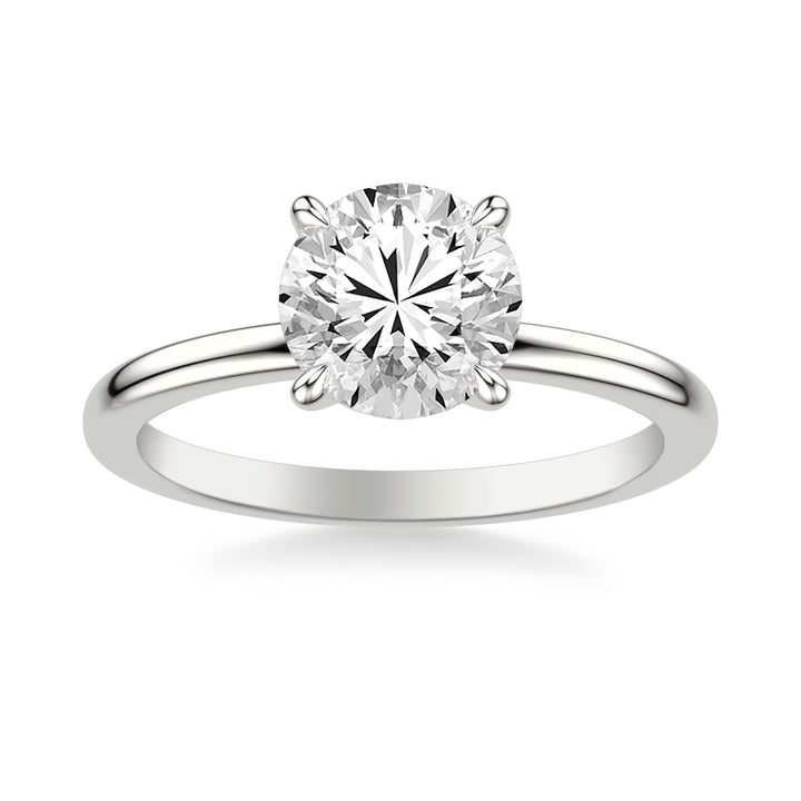 Classic Solitaire Engagement Ring with Claw Prongs and Polished Shank
