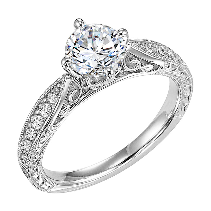 Masterfully crafted, this engagement ring dazzles with its round center stone and prong set diamond band with delicate milgrain and beautiful engraving .  Center Stone is not included.