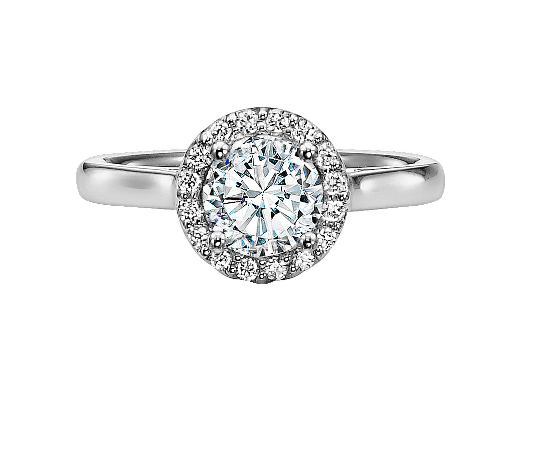 A magnificent diamond prong set halo gracefully accentuates the center diamond whilst paired with a high polished band for a timeless, spectacular design