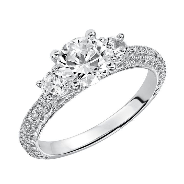 This eye-catching 3-stone engagement sparkles with its diamond prong set band with engraving and milgrain details