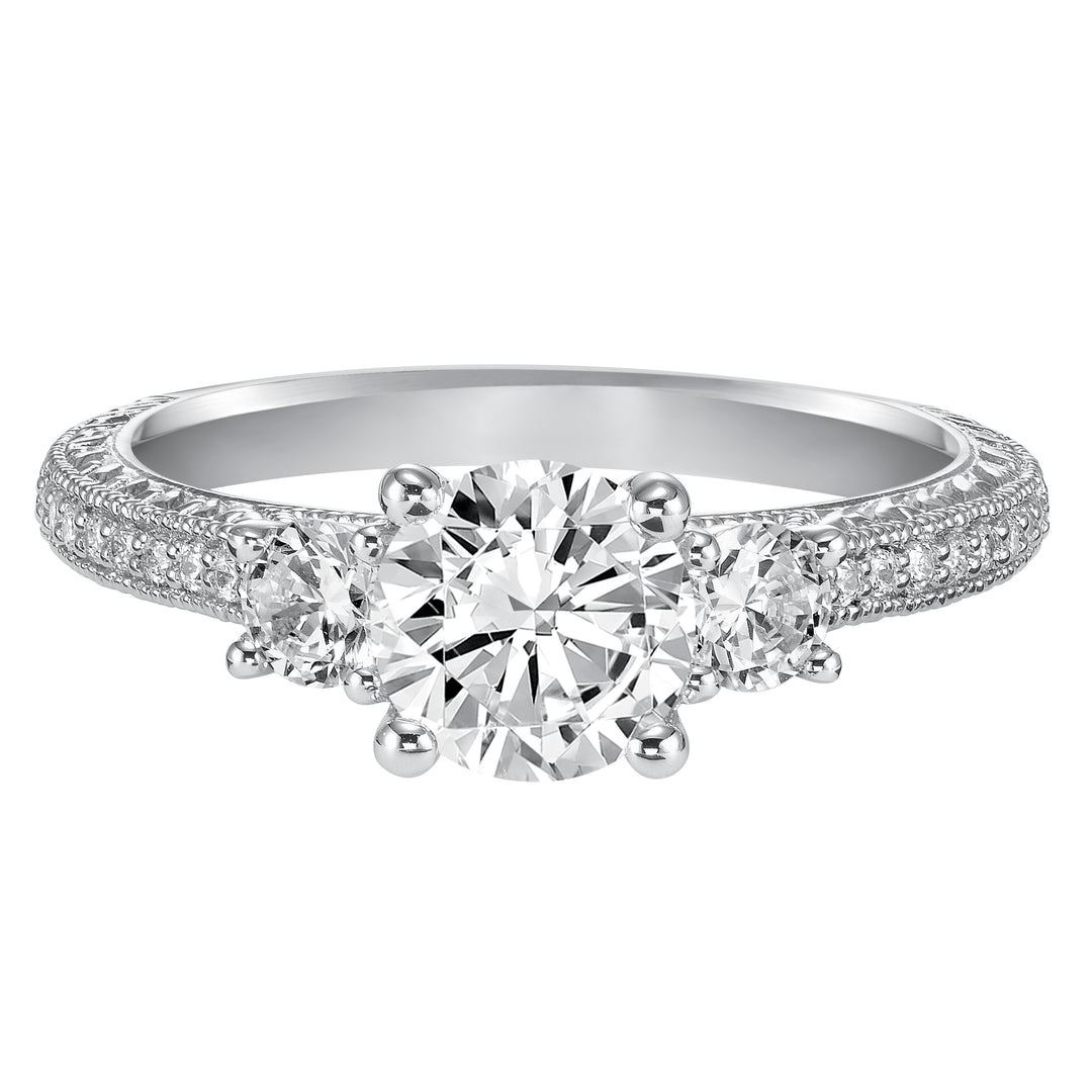 This eye-catching 3-stone engagement sparkles with its diamond prong set band with engraving and milgrain details