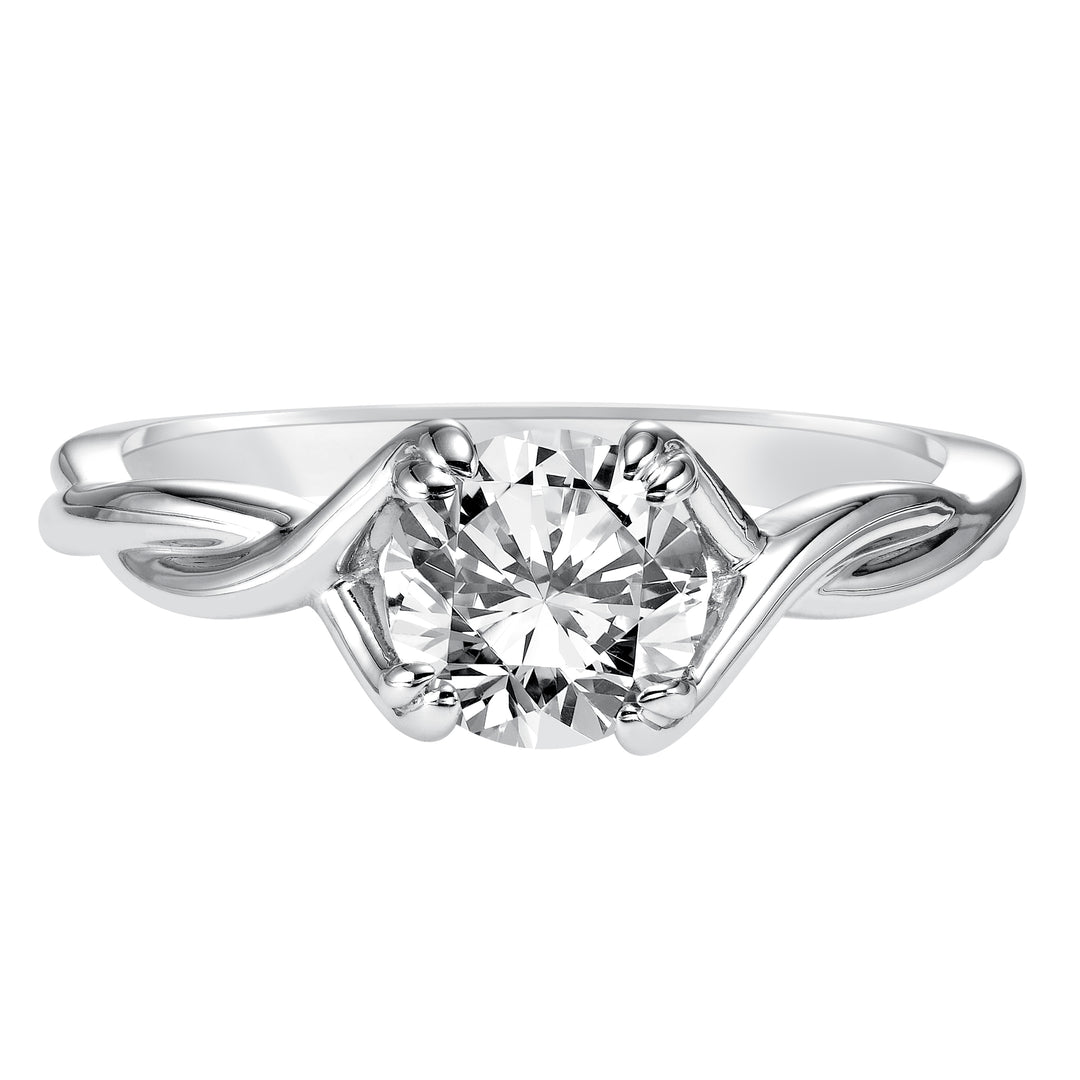 This ribbon-twist inspired high polished band gracefully accentuates the center diamond