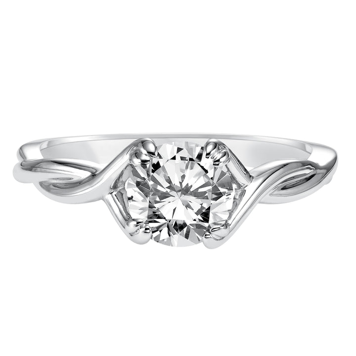 This ribbon-twist inspired high polished band gracefully accentuates the center diamond