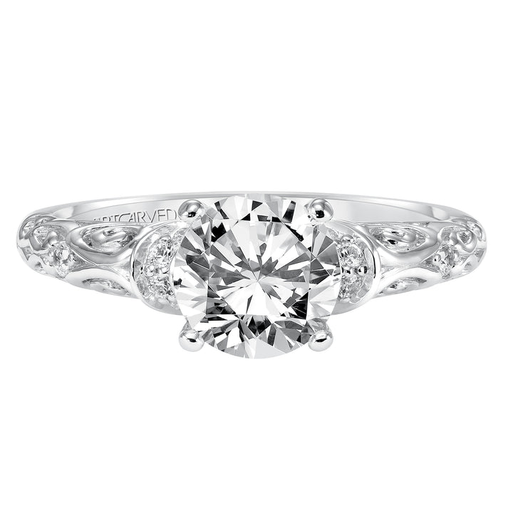 Diamond engagement ring with round center stone and carved diamond enhanced band